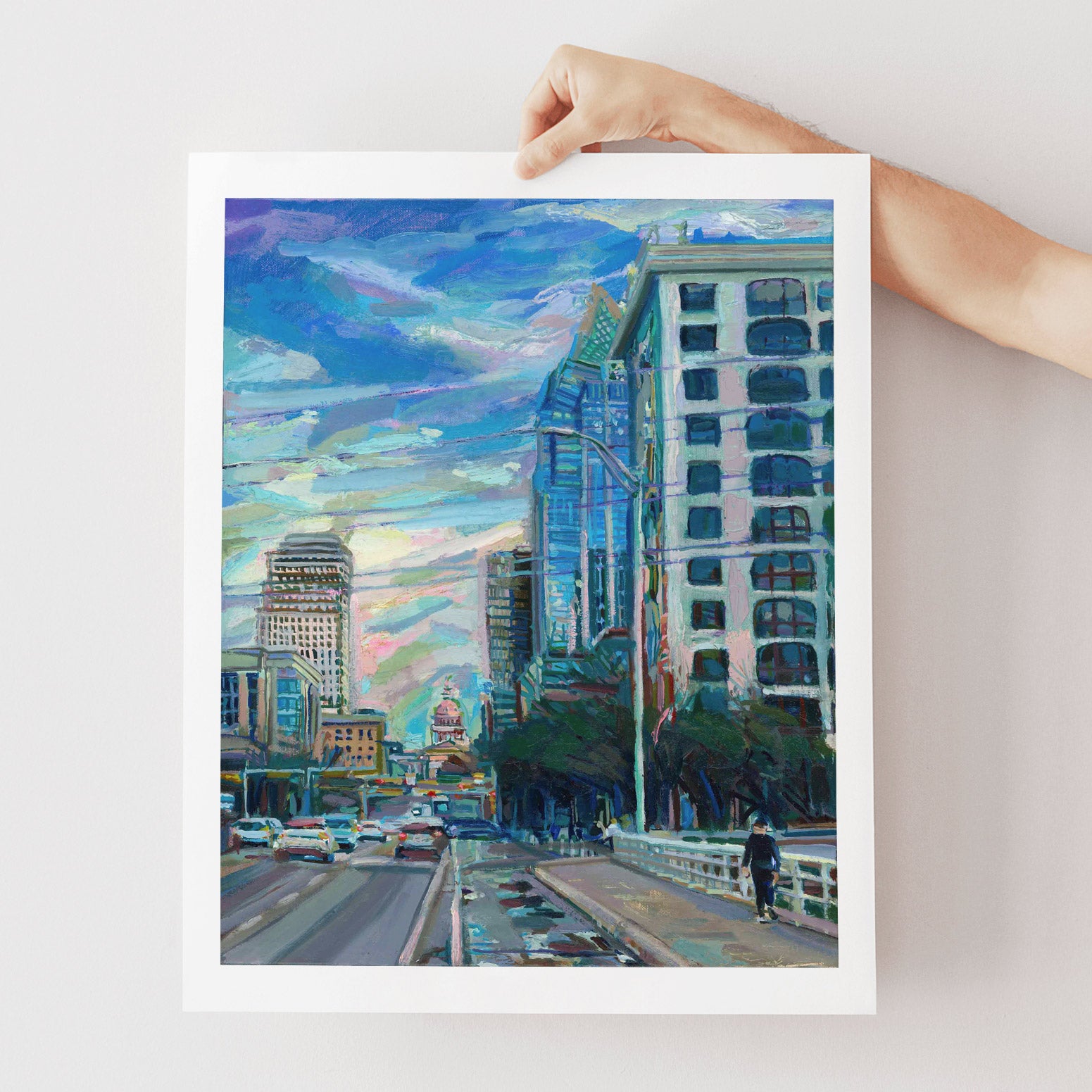 Art print of Austin Texas cityscape oil painting held by a hand. 16x20 print