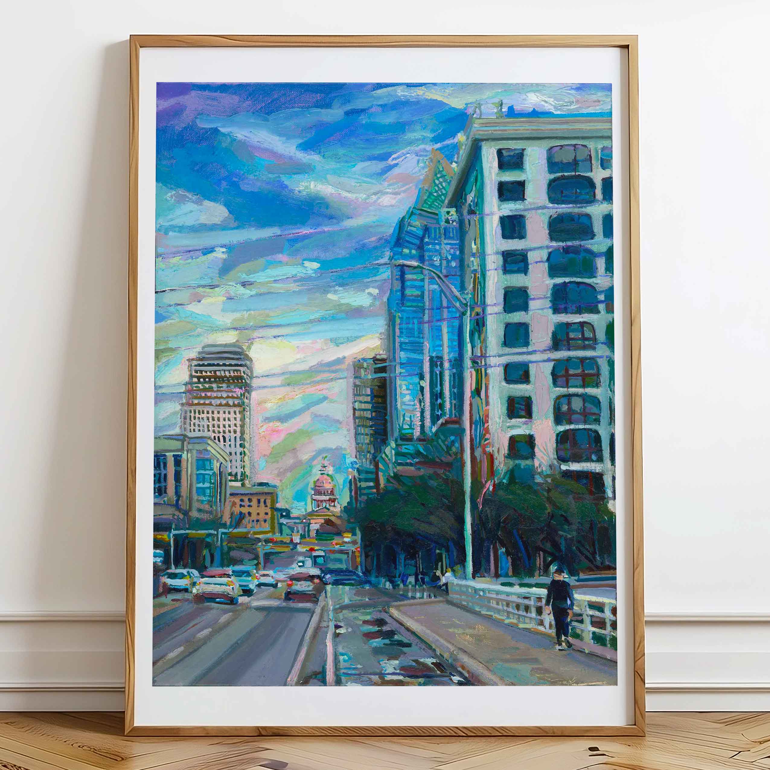 Austin Texas art print depicting a vibrant cityscape of Downtown Austin with the Texas State Capitol and Frost Building visible.