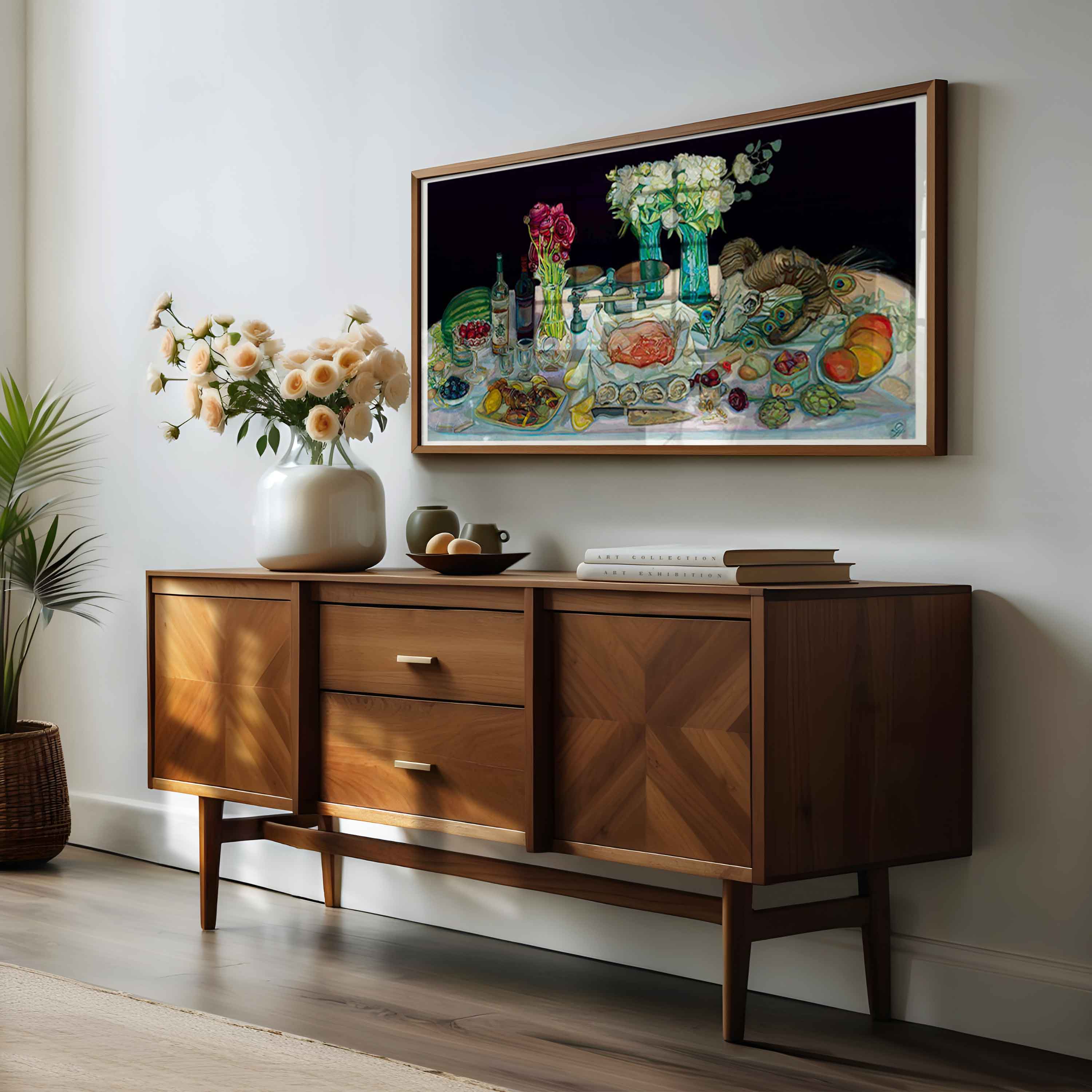 Food still life oil painting framed over wooden sideboard with Mid Century Modern decorative items and peonies in teal flower vase.