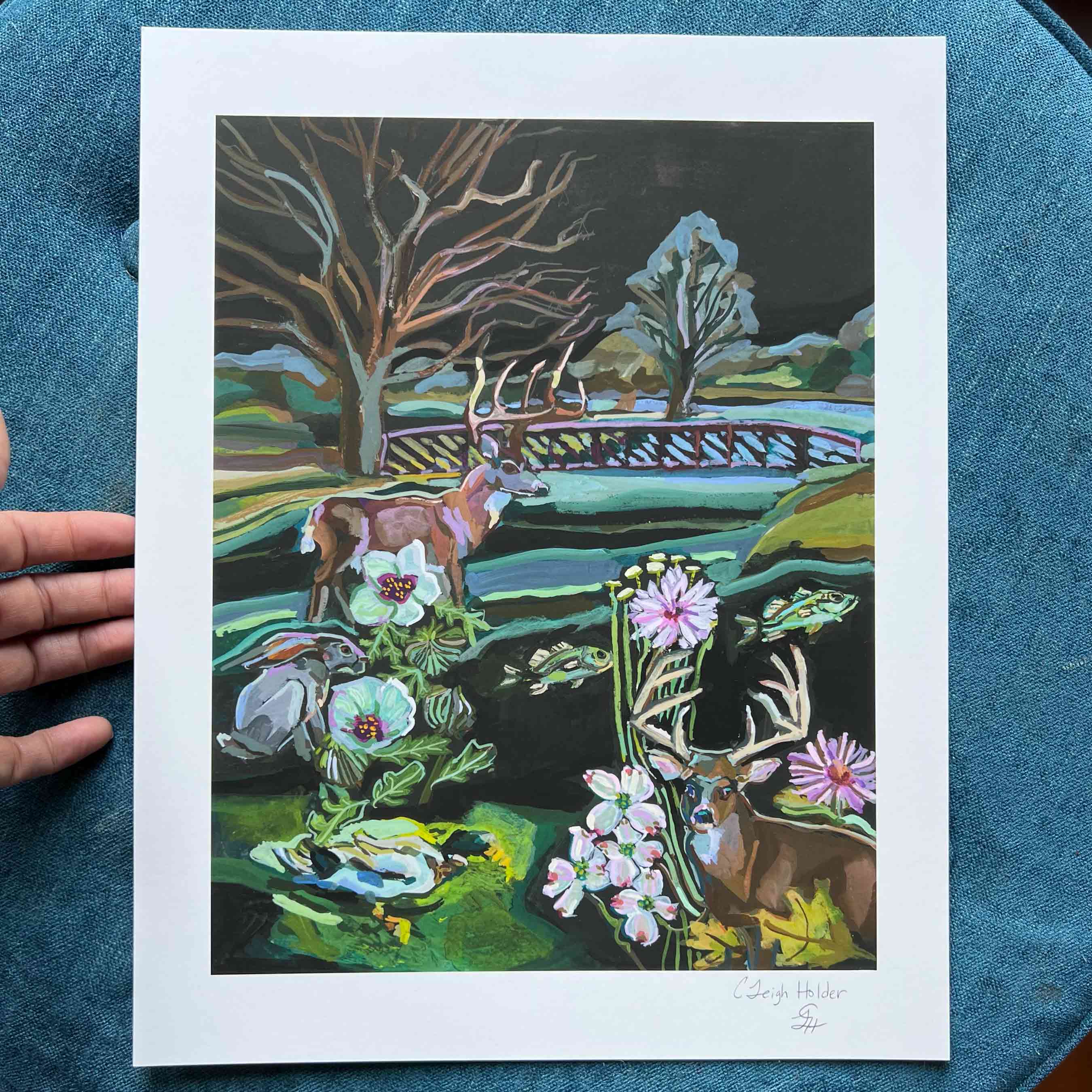 Art print of whitetail deer, duck, bass fish and nature scene on Texas river in New Braunfels, Texas on a blue fabric background.