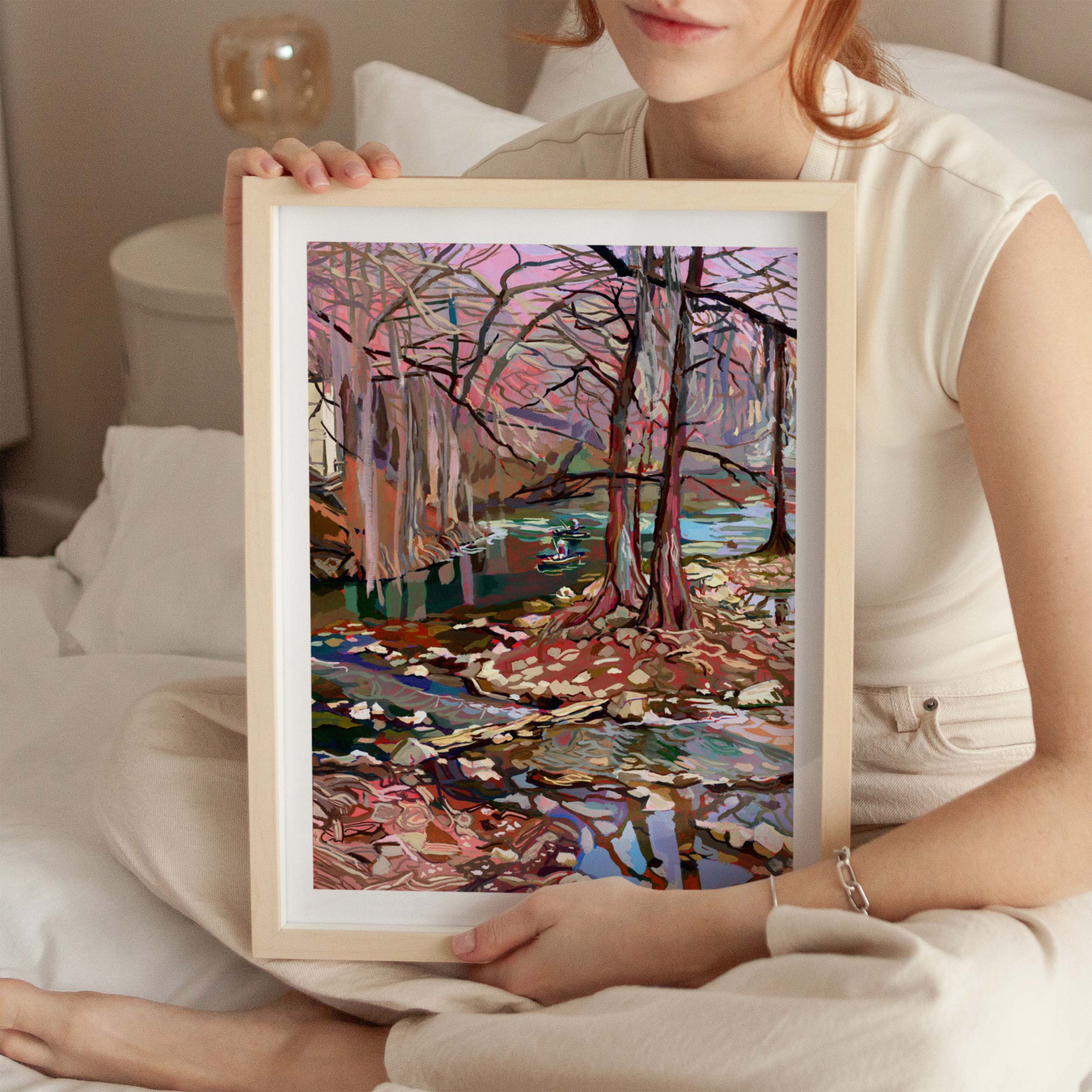 Guadalupe River painting with trees pink skies and winding river with canoe. Framed 11x14